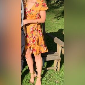 Yellow floral wrap dress